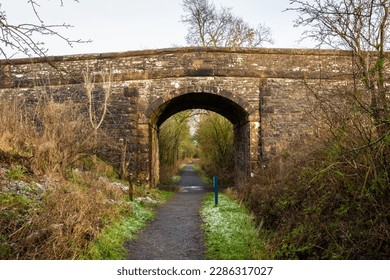 Road bridge over the old Paddy Line or Galloway railway line at Threave Estate, Castle Douglas, Scotland - Shutterstock ID 2286317027