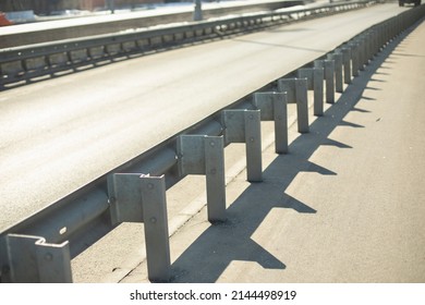 Road bumper on highway. Protection on highway. Side of road. Lane fencing.