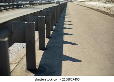 Road bumper on highway. Protection on highway. Side of road. Lane fencing.