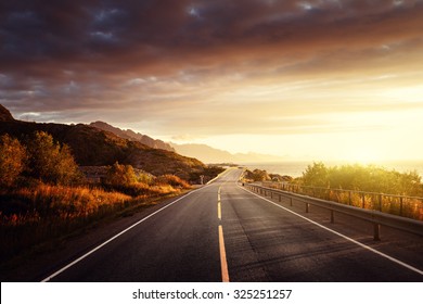 road by the sea in sunrise time,  Lofoten island, Norway - Powered by Shutterstock