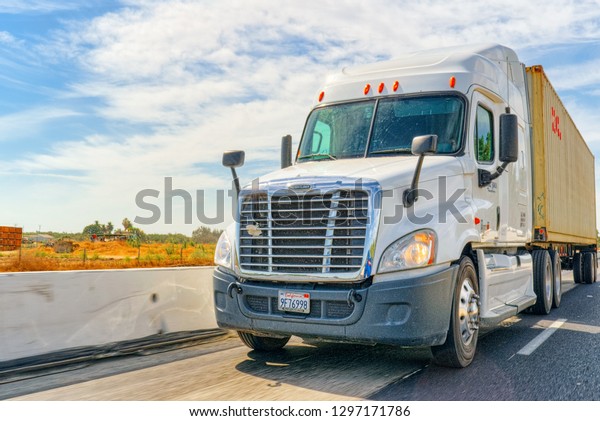 Road,  California, USA - September 13, 2018:\
American Truck Cab on the\
highway.
