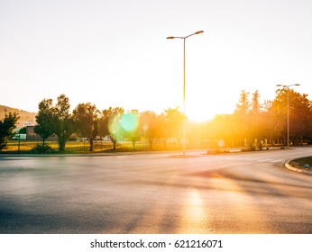 The Road To The City Of Sun And Glare At Sunset.