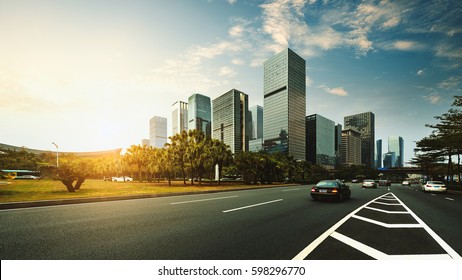 The Road In City With Sunset