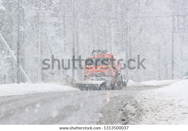 Road cleaning in\
snowfall