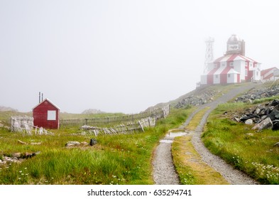 Road up Cliffs to  Red and White Lighthouse on Foggy Morning