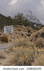 Road Closed Due To Winter Storms Warning Sign On Road As Snow Storm Approaches. Death Valley National Park