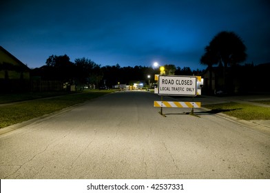 Road Closed Local Traffic Only Signage On Neighborhood Street At Night