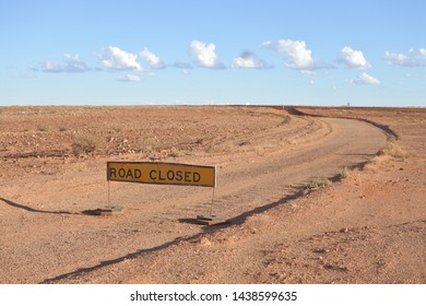 Road closed sign in the outback of the red center of Australia. No people. Copy space