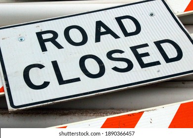 Road closed signs in street
