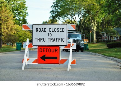 Road Closed To Thru Traffic Detour Construction Sign In A Residential Neighborhood