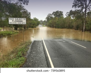 Road closure and flooding Australia. Location: Gympie, Sunshine Coast on on Can Bay Road - Shutterstock ID 739563895
