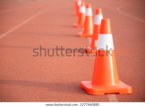 Road
cone on orange floor To block the way and
indicate