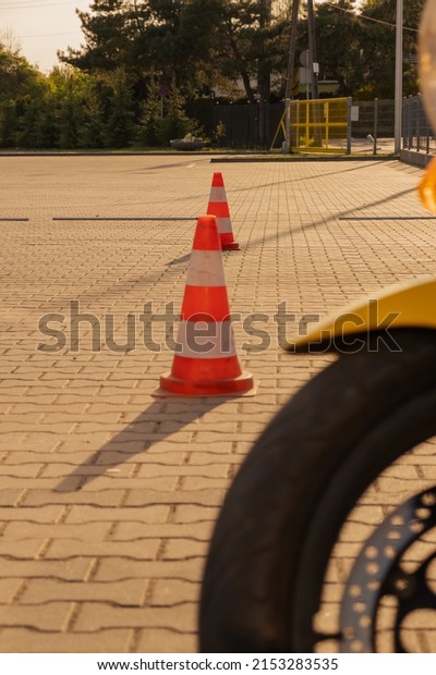 Road cones. Driving lesson. Attributes of a\
driving school.