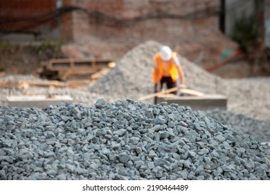 Road construction gravel texture , close up on pile of gravel for construction of a road at a construction site. Road construction background