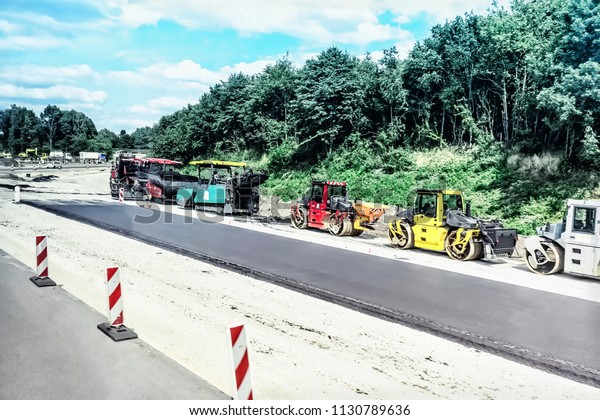 Road\
construction and tractor on the\
roadside