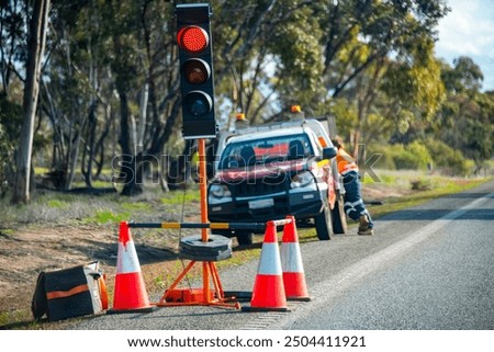 Road Construction Traffic Controller on the Highway