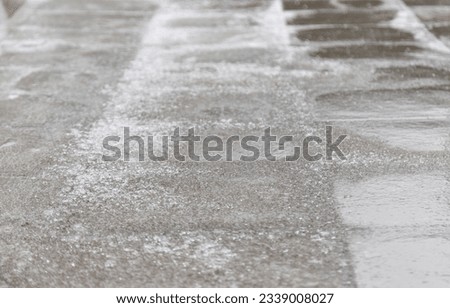 The road is covered with ice in winter. selective focus. nature.