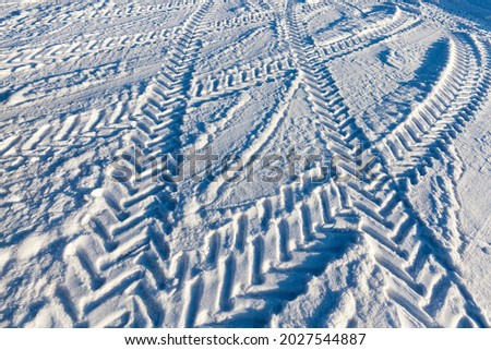 Similar – snow tracks Winter Ice