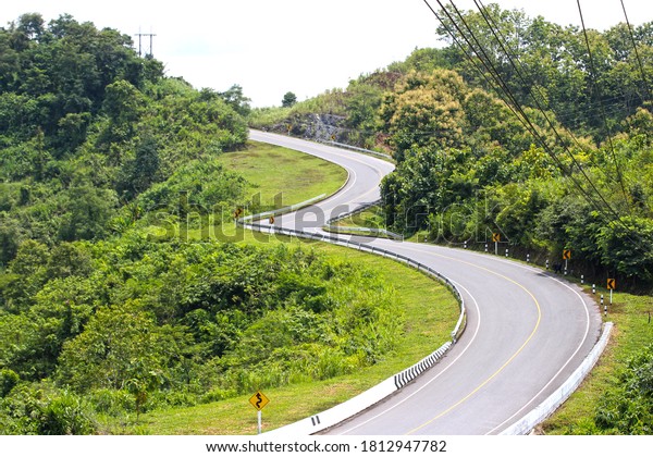 Road curve\
number three in Nan Province,\
Thailand