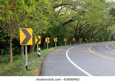 The Road Curve With Street Signs Reflex Light,At Night You Can See The Signs More Clearly.