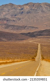 A road cutting through the harsh landscape of the Panamint Valley, Death Valley National Park, California, USA