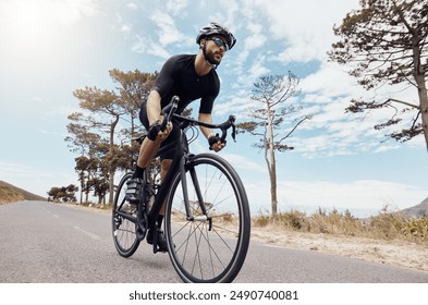 Road, cyclist or man in speed for training, competition and cycling race with endurance in Denmark. Outdoor, athlete and helmet for safety, fitness wellness and bike for sports adventure with energy - Powered by Shutterstock