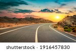 Road in the desert of Egypt at sunset