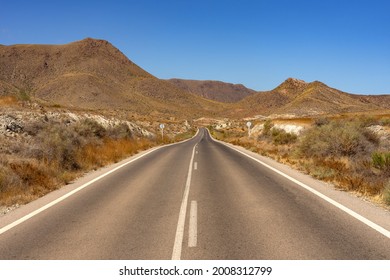 Road In The Desert Zone Of The Gata Cape Natural Park Coast. Almería, Andalucía, Spain.