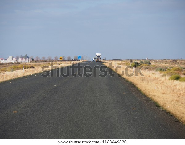 Road disappearing into the\
distance