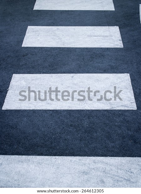 road with dividing white\
stripes