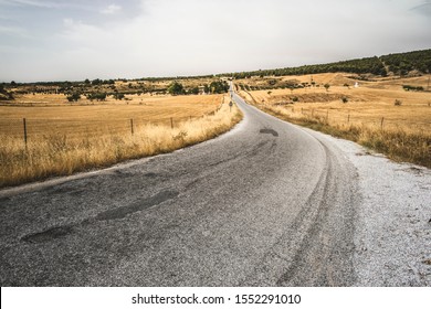 Road and dramatic cloudy sky