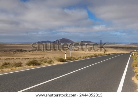 The road to Famara beach. It is an untamed sports beach ideal for doing water sports, La Caleta, Canarias, Spain