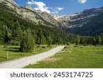 Road to Gavarnie Falls, spectacular waterfall in french Pyrenees, highest waterfalls in France, popular tourist landmark