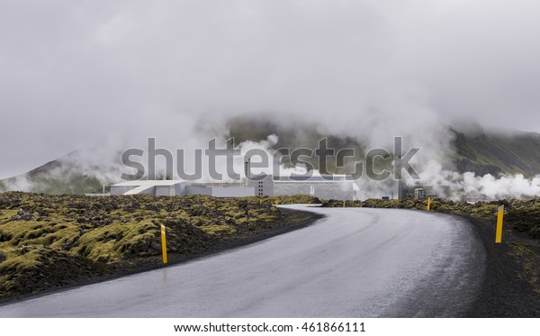 Road and geothermal energy works of Blue Lagoon in\
Iceland on a rainy day.