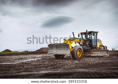 Road grader - heavy earth moving dirty 