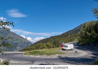 Road With Hairpin Curve And Van