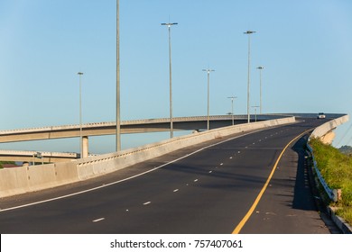 Road Highway Overhead Flyover Overpass Ramp With Vehicle On Entry Exit Route.