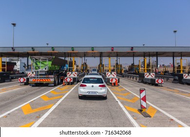Road Highway Vehicles Toll  Gates
Highway Tolls, South-Africa - Sept 15 2017: Drivers View traveling road highway toll gate booths vehicle route  on N3 at  Mooi-River KZ-Natal South-Africa.