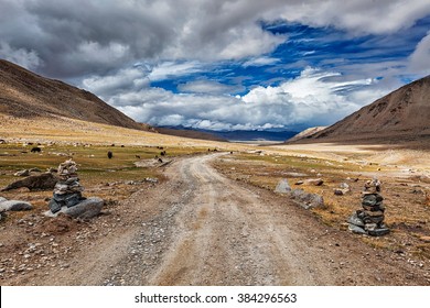 Road In Himalayas Marked With Stone Cairns. Ladakh, India