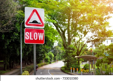 Road Hump Ahead And Slow Down, Keep Left And Do Not Overtake.