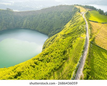 Road with Hydrangeas. Green Fields, Forest, Hills and Lake. Azores, Sao Miguel Island. Portugal. Aerial View