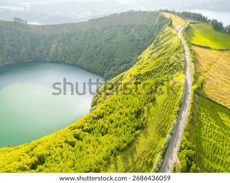 Road with Hydrangeas. Green Fields, Forest, Hills and Lake. Azores, Sao Miguel Island. Portugal. Aerial View