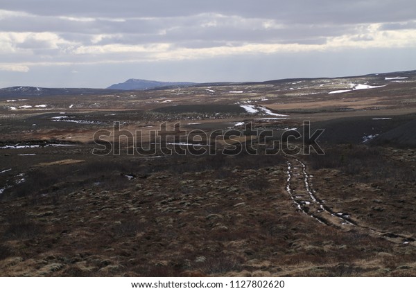 Road in\
Iceland. Landscape and road in winter, road trip on the country at\
Iceland. Beautifull nature of Iceland. Epic and majestic\
landsacapes. Route Number One (Ring\
Road).