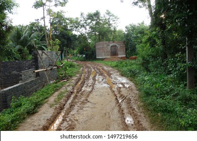 A Road To A Indian Village Is Damaged After Heavy Rain. 