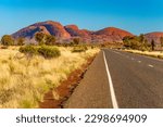 Road to Kata Tjuṯa (many heads) or The Olgas, a group of domed rock formations (bornhardts) Uluru-Kata Tjuṯa National Park, Northern Territory, Australia