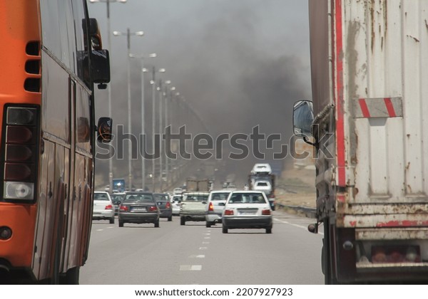 Road Lead to Smoke,\
West of Tehran, IRAN