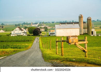 Road leading to an Amish farming community near Intercourse, Pennsylvania. - Shutterstock ID 1022024326