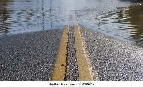 Road Leading into Flooded Street