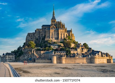 Road leading to Mont Saint Michael with its abbey and low tide