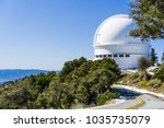 Road leading to Shane telescope, part of the Lick Observatory complex on top of Mt Hamilton, on a rare snowy winter day, San Jose, south San Francisco bay area, California